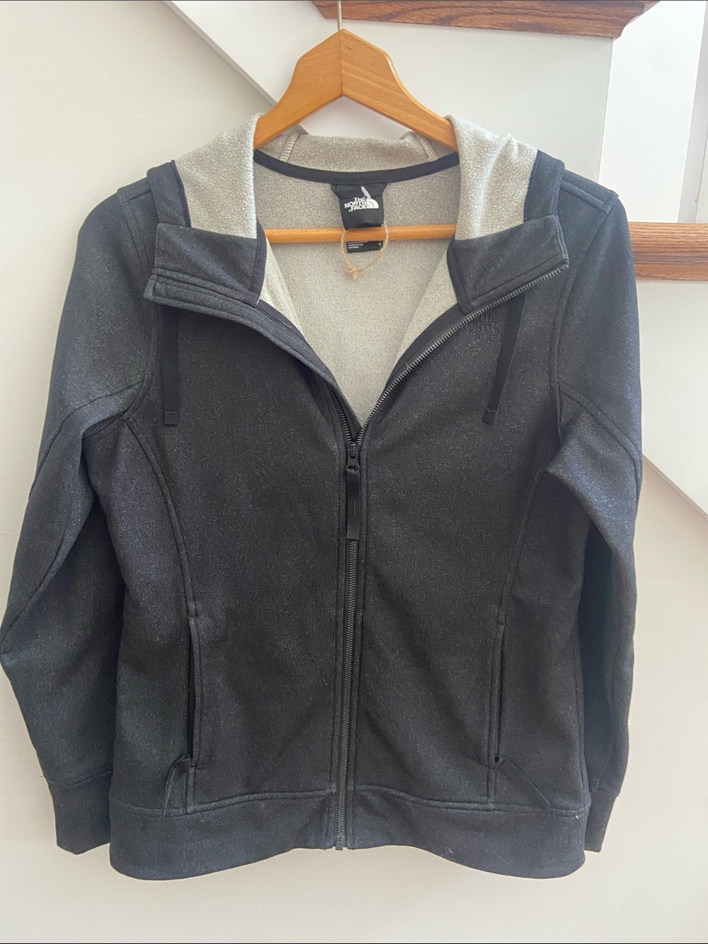 The North Face Women’s Black Hooded Fleece Jacket with Gray Lining